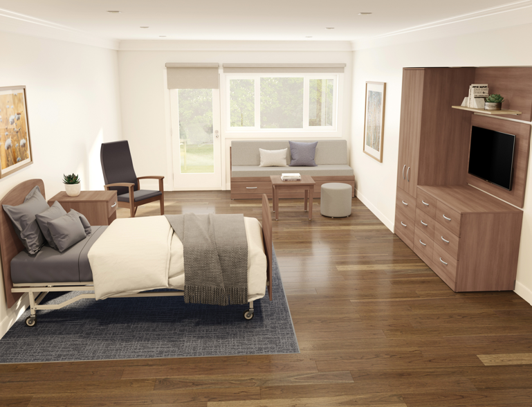 patient room with bed and several other pieces of healthcare furniture
